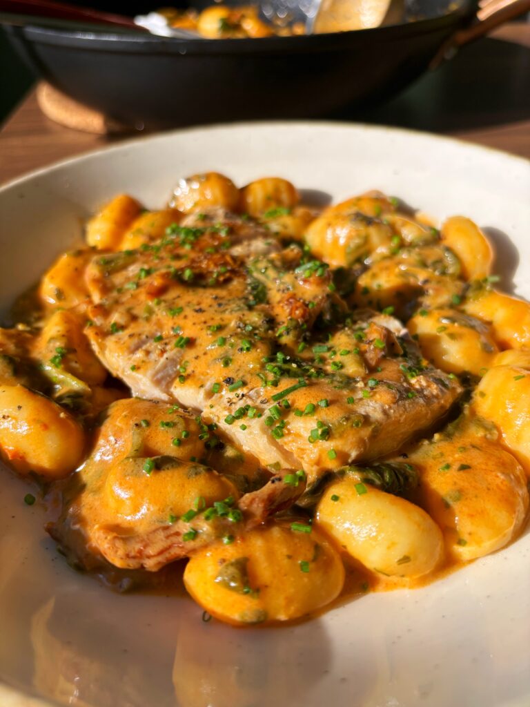 Creamy Sun Dried Tomato and Spinach Gnocchi with Pork Loin Chops