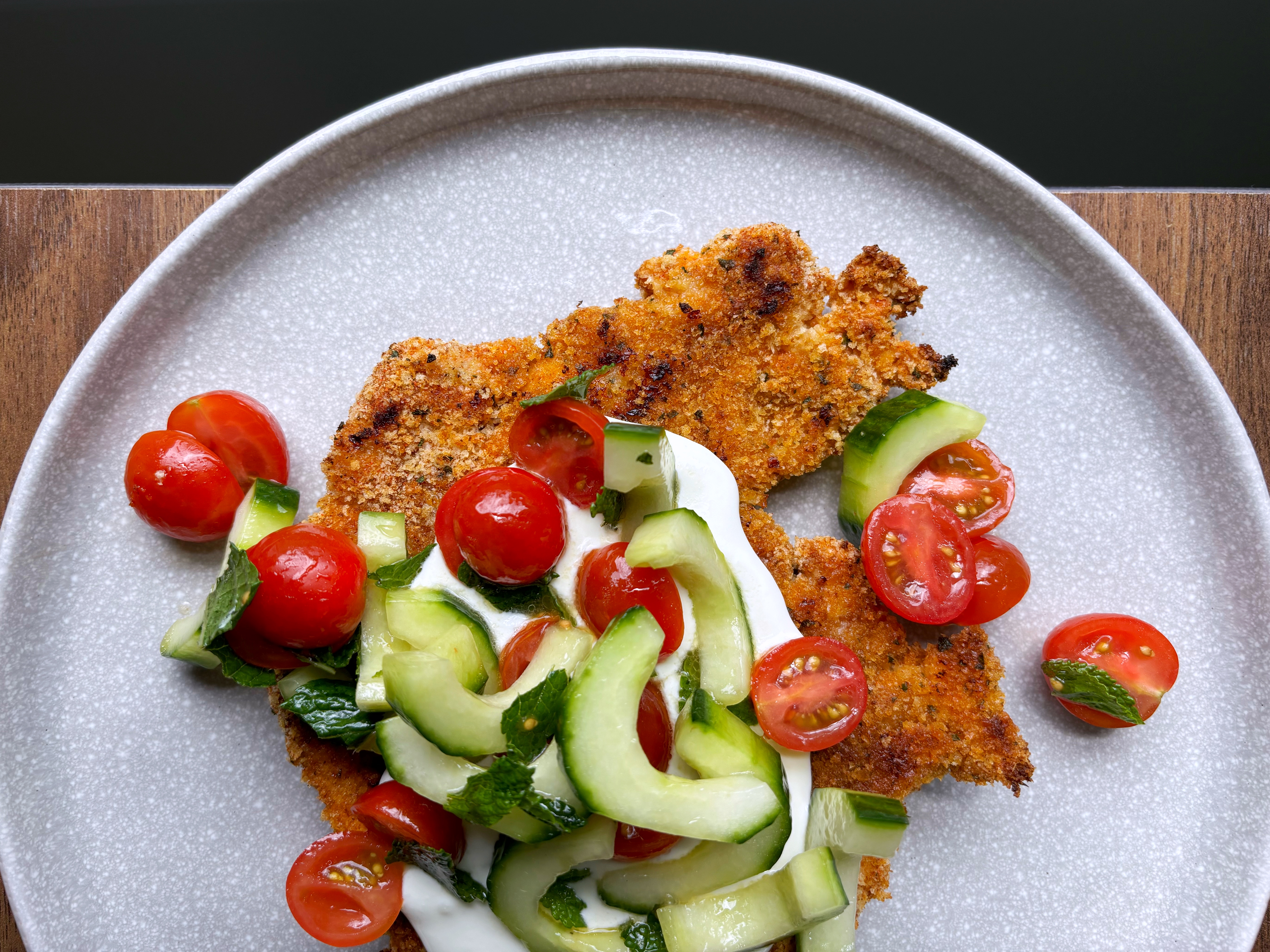 Crispy Baked Harissa Chicken with Tomato, Cucumber and Mint Salad